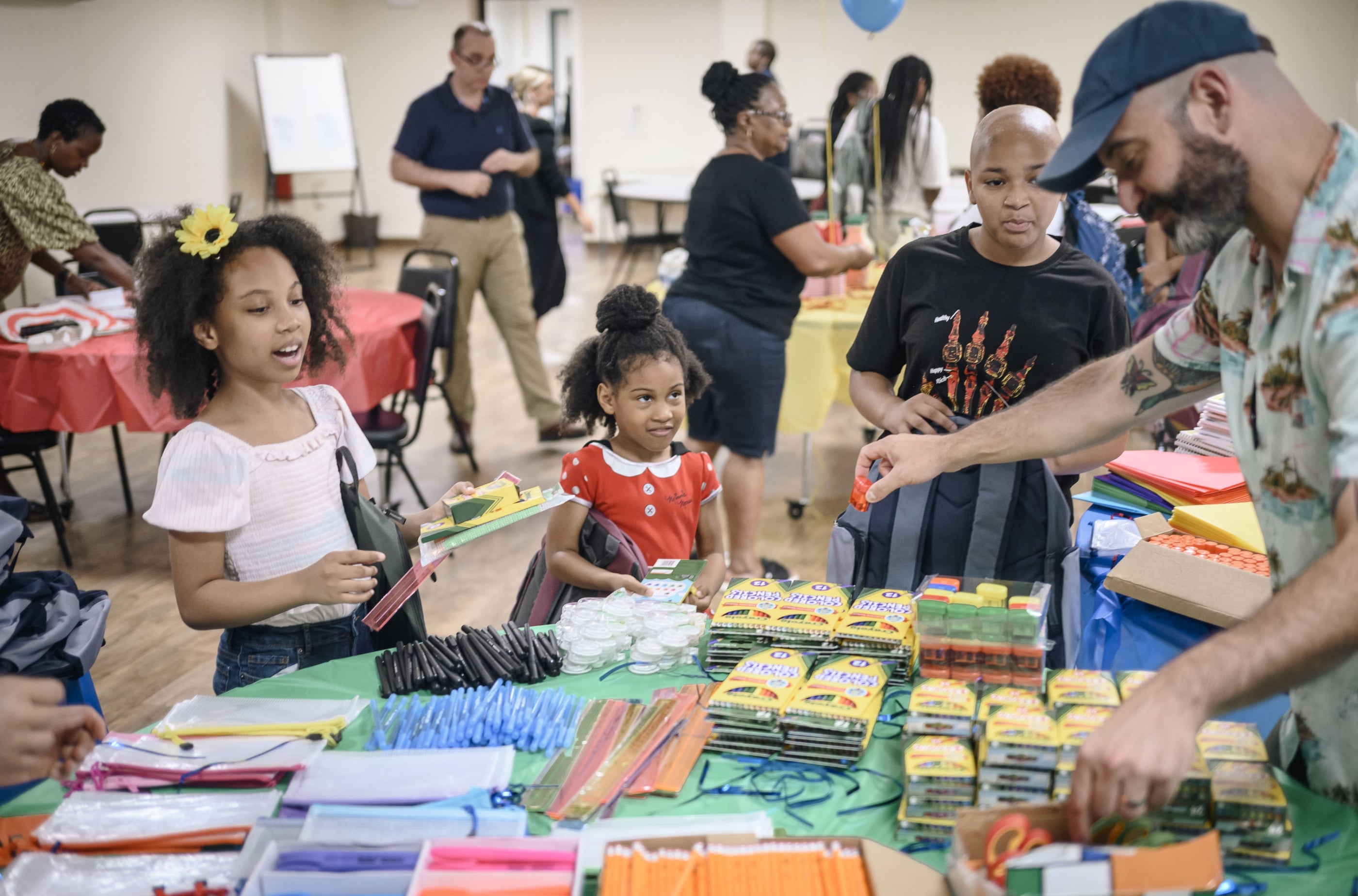 Belveron Donates and Distributes Backpacks and School Supplies in Harlem